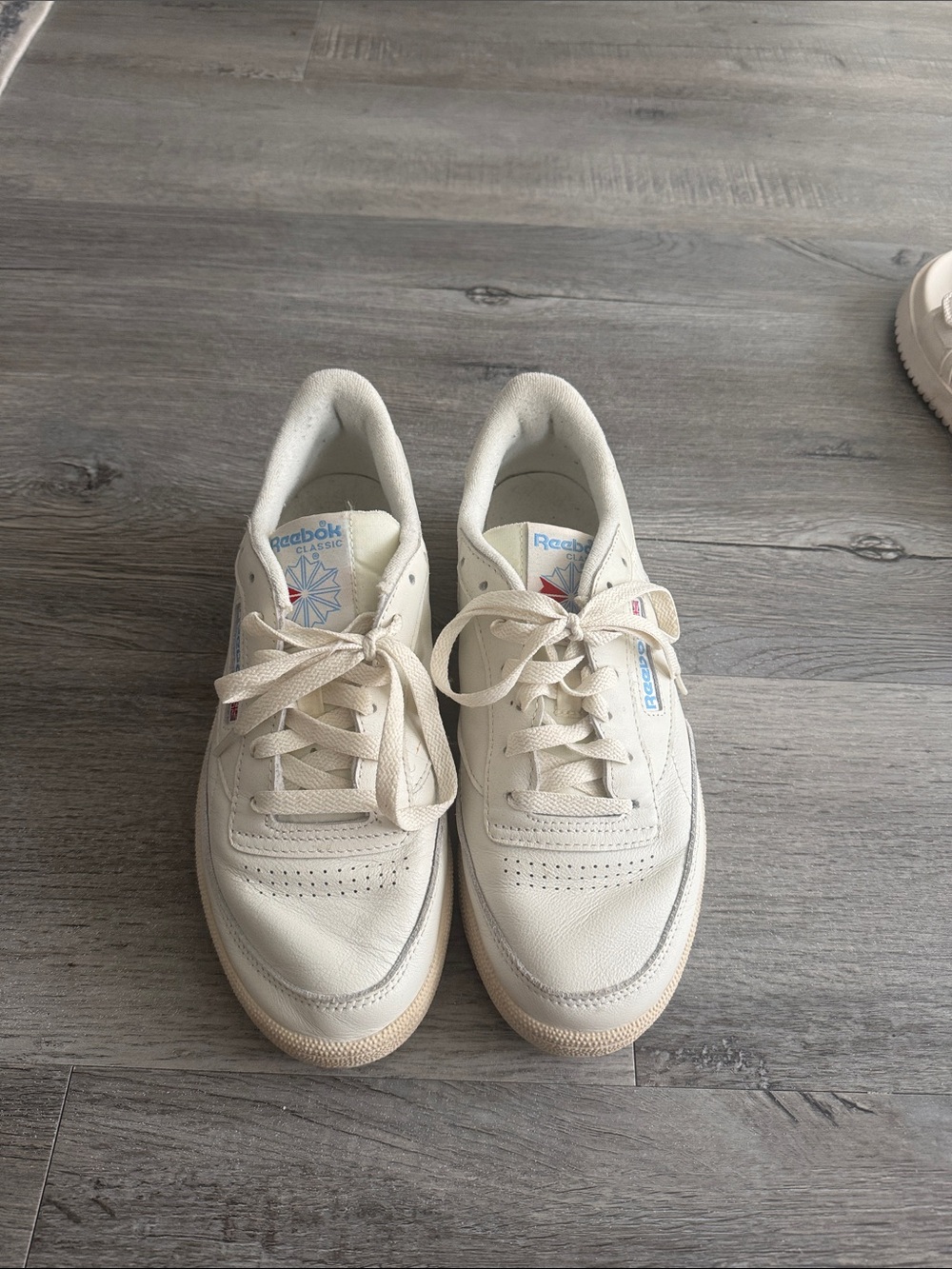 Reebok Off-White Leather Low-Top Sneakers with Blue & Red Logo